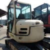 Miniexcavadora TEREX SCHAEFF HR 20 usada del 2004, 51 CV, 5.650 kg, con enganche rápido y cazo de 60 cm.