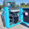 Vista detallada del motor diésel de la cargadora compacta Messersi SL35, mostrando su sistema de transmisión hidrostática y diseño robusto.