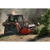 Eurocomach 18TL equipada con desbrozadora trabajando en zona forestal.