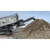Trituradora de residuos de construcción Komplet KROKODRILE, utilizada en proyectos de reciclaje para manejar materiales difíciles.