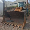 Cargadora Liebherr L-544 usada con cuchara reforzada, ideal para movimiento de tierras.