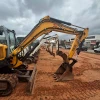 Excavadora Wacker Neuson 75 Z 3 con brazo extendido y hoja topadora en GRUPOCIBSA.