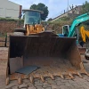 Cargadora Liebherr L-544 usada con cuchara reforzada, ideal para construcción y excavación.
