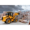 Pala cargadora Venieri 2.63 H amarilla manipulando pallets de materiales de construcción en obra bajo cielo nublado.