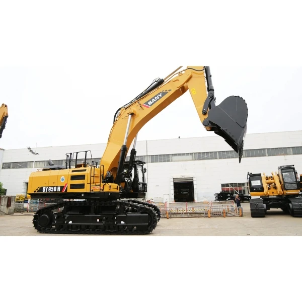 SANY SY950H Excavadora sobre orugas en entorno de fábrica.