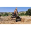 Cuchara seleccionadora MB-HDS407 acoplada a excavadora en obra.