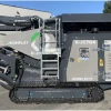 Komplet K-JC 704 vista lateral completa con sistema de orugas.