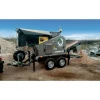 KOMPLET K-JC 503 con alimentador y cinta de descarga, solución compacta para obra con mantenimiento sencillo y operación segura.