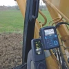 VEI HELPER XE en excavadora, sistema de pesaje a bordo con pantalla y teclado; gestión de datos IPOTWEB y TrackWeight.
