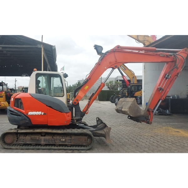 Vista Lateral Kubota KX080-3 Segunda Mano Con Brazo Y Cazo.